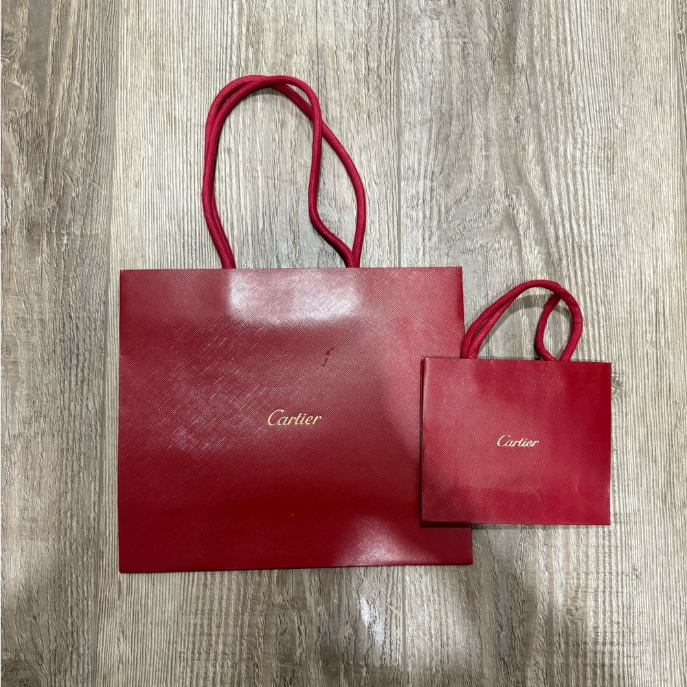 2 Cartier shopping bags